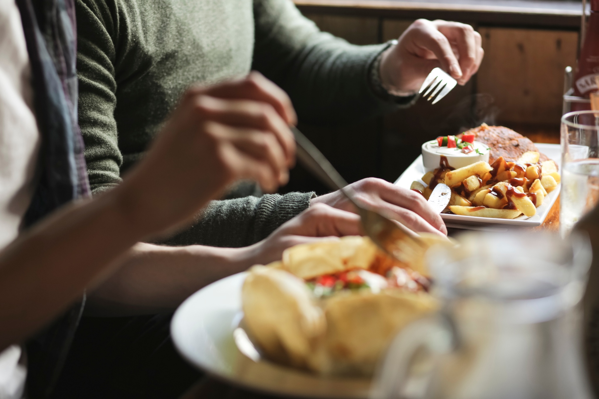 Diners enjoy a meal at the Clachaig Inn